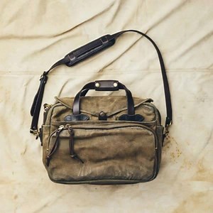 5.8K views · 60 reactions | Industrial-strength Rugged Twill. The toughest luggage you’ll ever own. | Filson | Facebook