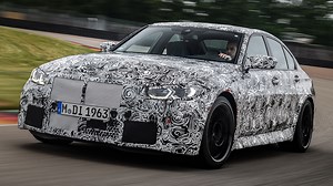 Watch: 2022 BMW M4's Stick Shift Gets a Workout on the Track