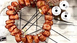 This fall ribbon wreath is SO easy to make! Doesn't look like much while you're making it....but wait until the end when it’s all opened up! It’s so pretty. All the supplies were from Dollar Tree! | We Craft Around