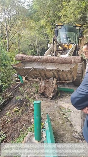 Converting a loader into a winch – the power to pull trees up mountain roads.