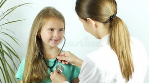 A Girl Listens To a Heartbeat with a Stethoscope Stock Footage - Video of hand, healthy: 116003804
