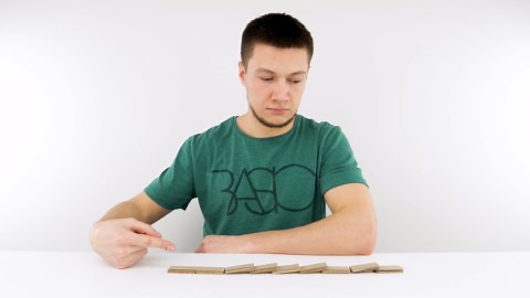 DIY domino-pushing car: Step-by-step cardboard robot build with recycled materials!