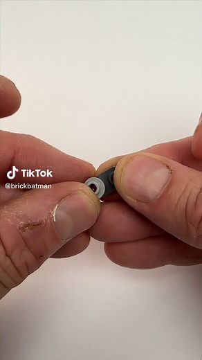 Building LEGO Grappling Hook Gun… wanted to make a quick video for some of you asking how to make this working grappling hook gun with the new Bazooka Mini Blaster part. The key is using the bar with 1 x 1 round plate instead of a normal 1 x 1 round plate. Getting the grappling hook to grab on to things is luck but for me it is working about 25% of the time all the time. Let me know how it works for you! #lego #tutorial #batman #thebatman