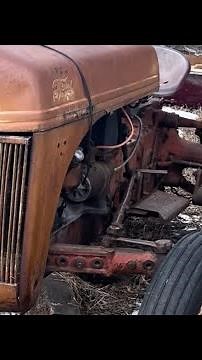 Checking out the old ford 8n with rare factory attachments!