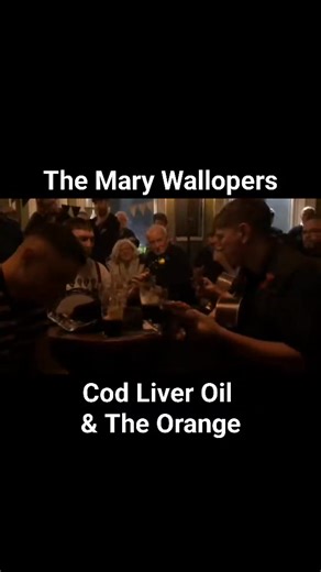 "Cod Liver Oil and the Orange Juice" is a Scottish folk song written by Ron Clark and Carl MacDougall, popularized by singer Hamish Imlach, which has also been covered by bands like The Mary Wallopers. The song's title references a historic nutritional supplement given to pregnant women and children, and it is a humorous and cheeky story about a Glasgow woman nicknamed "Hairy Mary" and her encounter with a man called "The Hard Man". The Mary Wallopers are an Irish folk music group based in Dunda