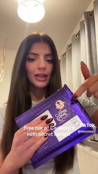 The QR codes are all over the UK, you just scan it to send a free bar to someone !!! I had no clue this existed but guys it works!!! @CadburyUK #cadburyssecretsanta