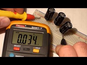 Measuring series and parallel capacitors with electronics multimeter that can tutorial lesson.