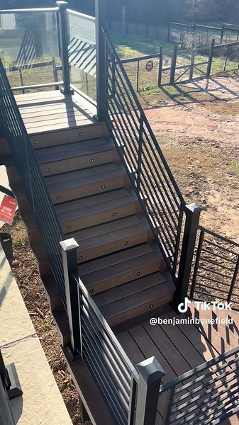 Fortress Evolution steel frame with Trex flooring and Fortress AI13 Glass panels featuring Fortress Axis Handrails #woodworking #construction #builder #contractor #fyp #genxtiktokers #GenX #motivation #deck #fortress #trex #grilldeck #wood