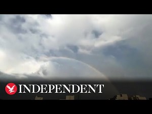 Stunning timelapse shows rainbow emerging from storm