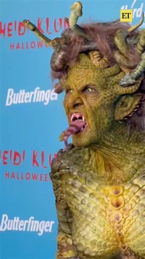Entertainment Tonight on Instagram: "Heidi Klum told us this year's costume was going to be "very ugly"… and she didn't lie!⁠ The Queen of Halloween transformed into Medusa, complete with husband Tom Kaulitz as a soldier turned to stone."