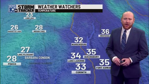 Evening snow shower Monday; clearing late