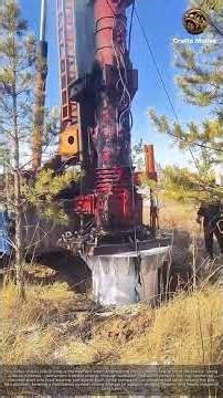 Foundation Piles Witness the Diesel Hammer Driving Process: Driving Concrete Piles a Giant Hammer