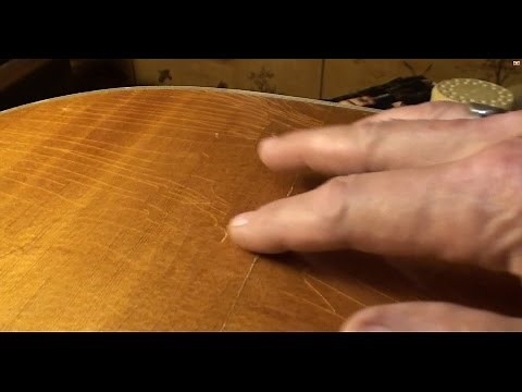 Acoustic guitar cracked top repair by Randy Schartiger guitar repair videos