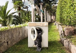 Can You Put Washing Machine Outside (Explained) - Cleaners Talk