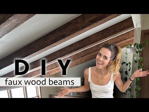 DIY Distressed Faux Beams Ceiling Transformation