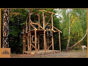 Construction of a two-story house from a tree. DIY