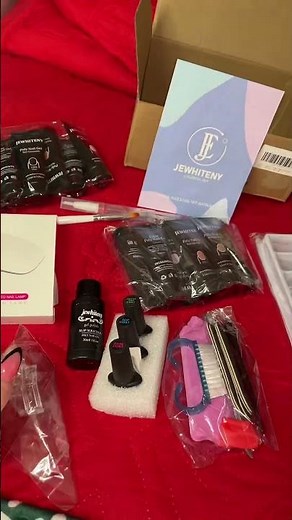 Create salon-style nails at home with the JEWHITENY Poly Nail Gel Extension Kit, featuring 14