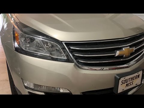 How to replace a headlight bulb in a 2016 Chevy Traverse