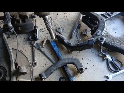2006 gmc envoy how to change lower control arms
