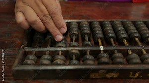 chinese abacus is a calculating tool used primarily in parts of Asia for performing arithmetic processes. The abacus was in use centuries before the adoption of the written modern numeral system.