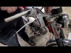 Fix stuck twist throttle on vintage Honda motorcycle.