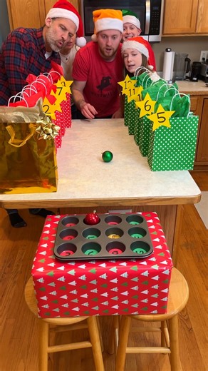 2.7M views · 27K reactions | Christmas Muffin Tin Challenge 療 Mom, Dad, and family roll an ornament into the muffin tin to see what prize they will get. The ultimate prize is really exciting! Super fun for a Holiday party. | Peter B | Facebook
