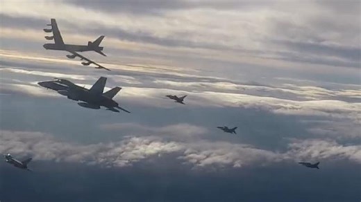 NATO has released footage showing a pair of American B-52 bombers on a mission.