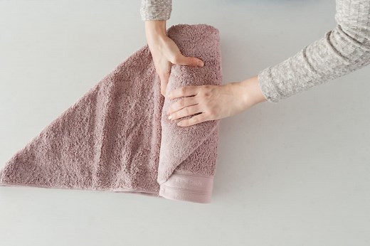How to fold towels: Simple towel styling tricks to roll or fold towels