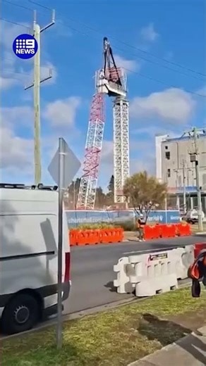 Crane comes crashing down in Melbourne's west | 9 News Australia
