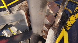 Offshore jack up drilling rig leg during jacking up. General view of welded steel lattice leg structure.