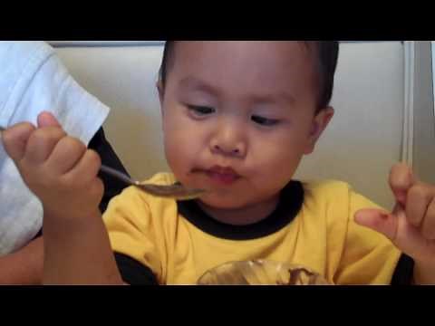 Baby Eating Pudding