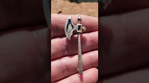 Amazing silver axe discovered ¦ can you date it?
