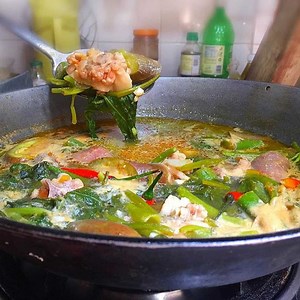 Learn how to cook sinigang na baboy using these simple steps