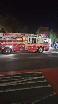 FDNY Engine 88 and Ladder 38 Passing By On Fordham Road In Belmont, The Bronx, New York City