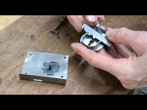 Lock making for a grandfather clock.