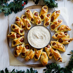 Pigs in a blanket wreath with maple-mustard dipping sauce