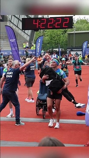 Kevin Sinfield carries Rob Burrow across the finish line