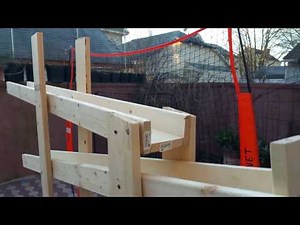 Homemade baseball soft toss pitching machine.