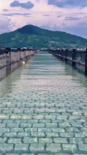 Human Beach in Etajima-Hiroshima, the path that gets submerged at high tide, “sea promenade”.