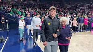 905K views · 38K reactions | This day always just means a little bit more. Every year, Notre Dame Football student-athletes escort those who bravely battle breast cancer in a celebration of strength during Notre Dame Women's Basketball’s Think Pink game. #GoIrish | Notre Dame Fighting Irish Athletics | Facebook