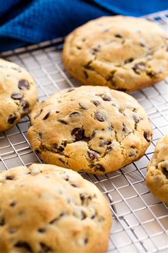 29K views · 459 reactions | The ultimate bakery-style chocolate chip cookie is thick, chewy, and loaded with melty chocolate chunks. Golden on the outside and soft in the middle, it’s the kind of cookie that never lasts long. https://thestayathomechef.com/bakery-style-chocolate-chip-cookie/ | The Stay At Home Chef | Facebook