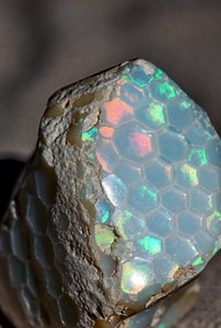 88K views · 2.9K reactions | White Opal With Honeycomb Pattern | Blue Light Gemstones | Facebook